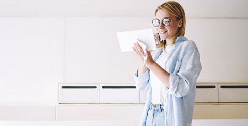 woman opening letter 